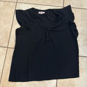 Black top. Cap flutter sleeves